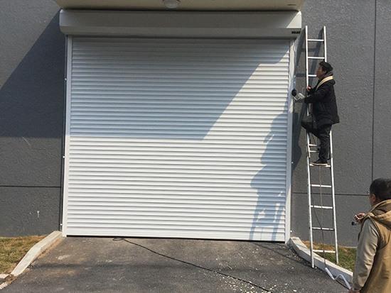 辽宁沈阳卷帘门厂家批发保温卷帘门电动卷帘门厂家直销上门安装