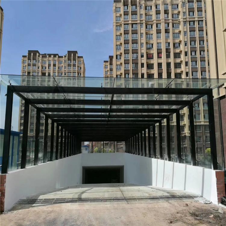 沈阳鑫艺科玻璃雨棚厂家  